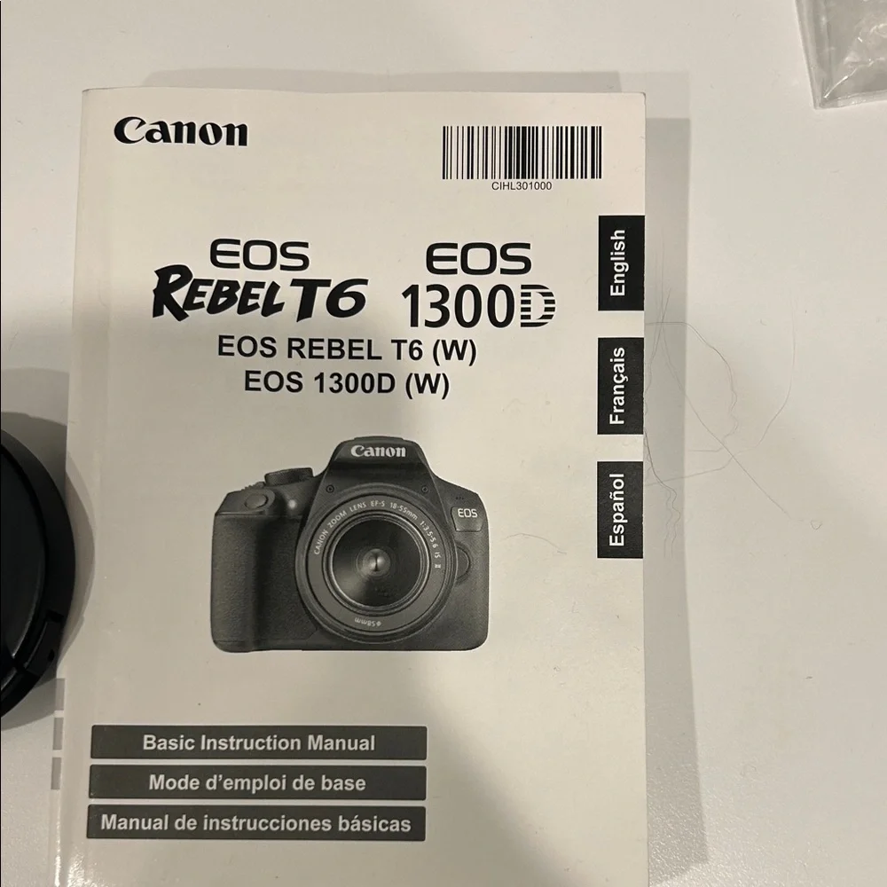 Canon EOS Rebel T6 1300D DSLR Camera with Black and Red Accents